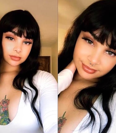 a woman with tattoos on her chest 