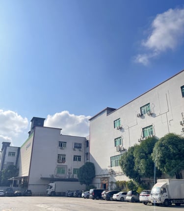a parking lot with cars parked in front of a building