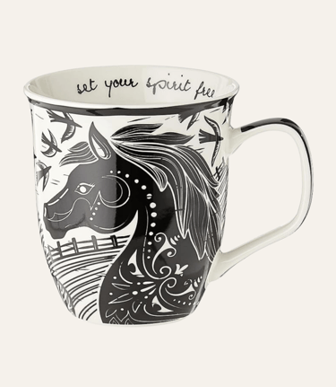 picture of cream colored mug with a black horse head design on it and handle.