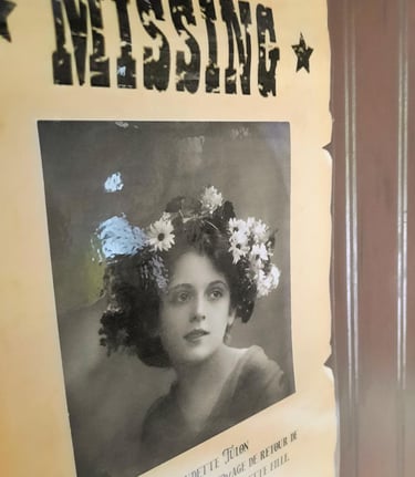 Missing poster of a young witch inside the escape room