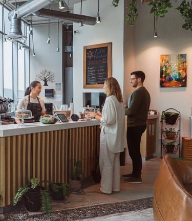 a woman standing in front of a counter top
