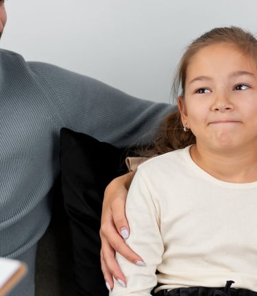 Parents in family therapy with their child