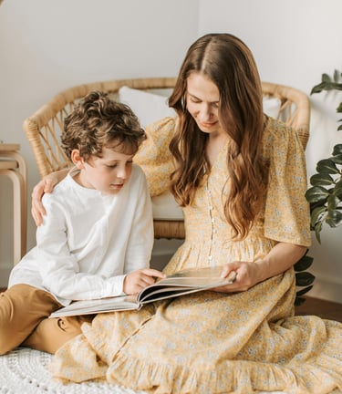 mother and son are reading a book