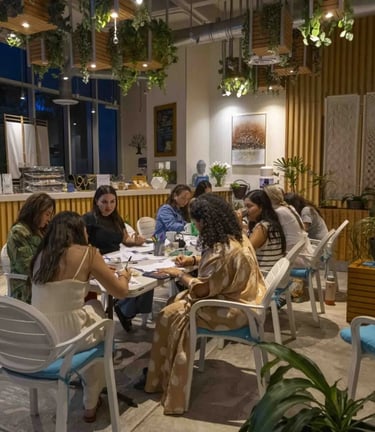 a group of people sitting at a table