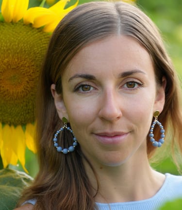 a woman with a sunflower in her hair