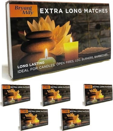 a box of extra long lasting candles with candles