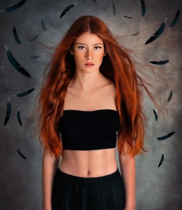 red head girl with freckles, wearing black skirt and crop top. Black feathers around her 