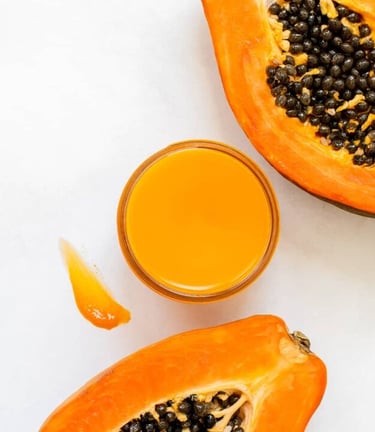 Homemade papaya lip balm with coconut oil, shea butter and beeswax