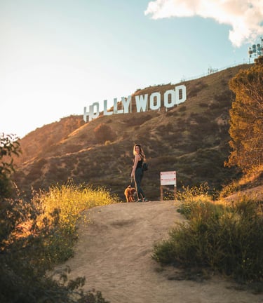 woman-with-dog-hollywood-sign-hike