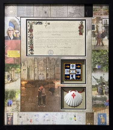Framed Camino de Santiago pilgrimage collage with Compostela certificate, scallop shell, and hiking photos.