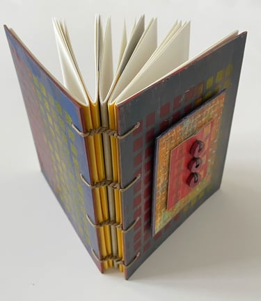 Coptic binding with bead cover detail