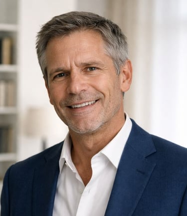 a man in a suit and white shirt