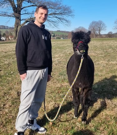 a picture of me with a alpaca