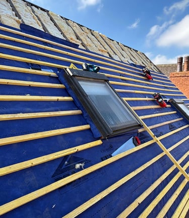 a roof top with a skylight and a skylight