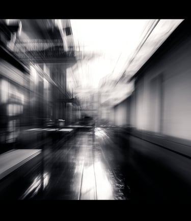 a blurry photo of a clock tower in a city