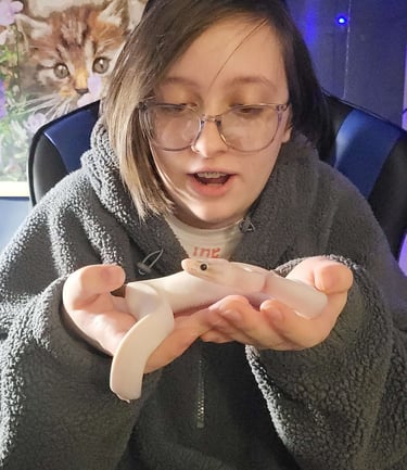 a girl holding a shake 