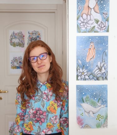 a woman in glasses and a blue shirt