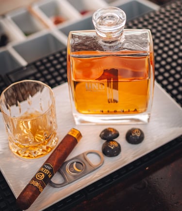 a bottle of luxury uno tequila sinfonia and cigar