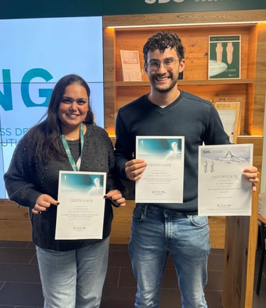 Dr Dhiman and Manzano holding certificates