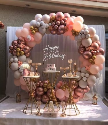 a birthday party with balloons and balloons