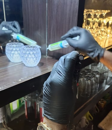 Pest Control technician applying gel bait for ants control
