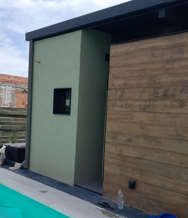 Casa con revestimiento texturado VERDE A llana Rulato