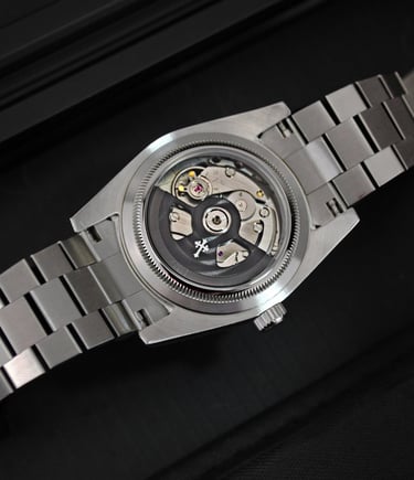 a watch with a metal bracelet