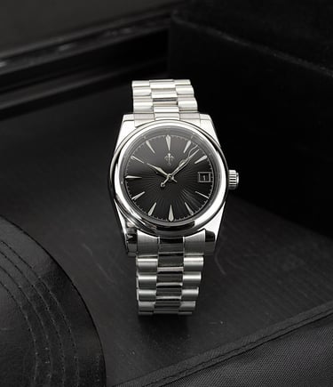 a watch with a metal bracelet