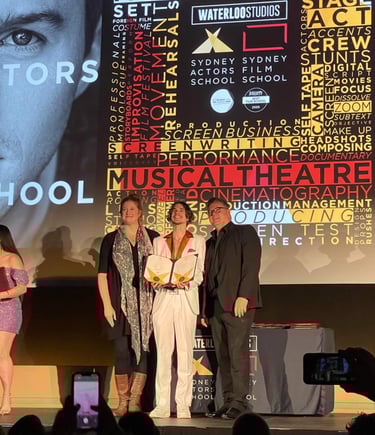 a group of people standing on a stage