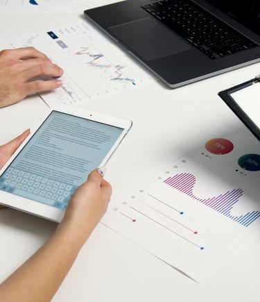 ipad and graphs on table