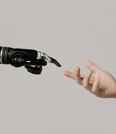 a person's hand reaching out to touch a robot's hand