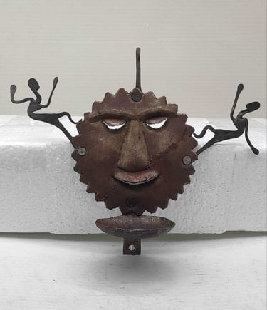 "Handcrafted iron oil lamp with sun face and two tribal figures-for export markets"