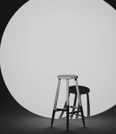 Minimalist studio photograph with dramatic lighting used to represent video-led brand storytelling