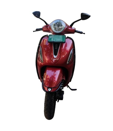 Front view of a red electric scooter with a green license plate, isolated on a white background.