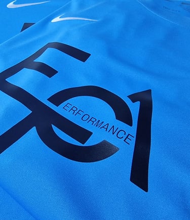 a blue shirt with the word epa performance on it