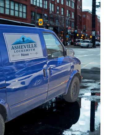 Blue Asheville Locksmith Now service van driving through West Asheville on rainy day