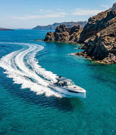 Aerial view of Saxdor 320 GTC speeding along volcanic coastline in Milos Cyclades
