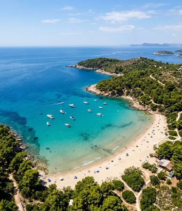 Aerial view of Sunj sandy beach on Lopud with turquoise water and anchored boats