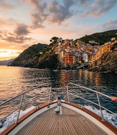 Private boat bow approaching Riomaggiore village at sunset on the Ligurian coastline