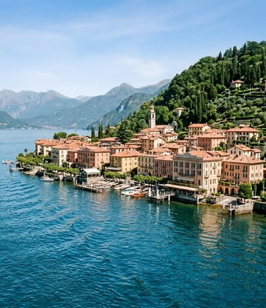 Bellagio promontory waterfront with pastel buildings and mountains seen from Lake Como boat