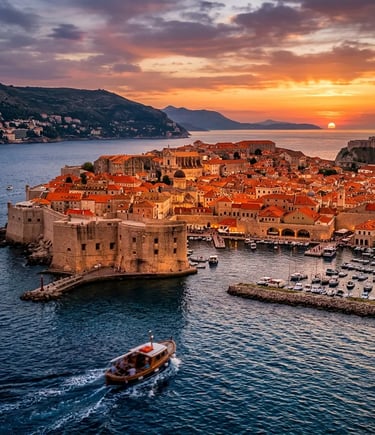 Dubrovnik ancient city walls and terracotta rooftops at sunset from Adriatic Sea