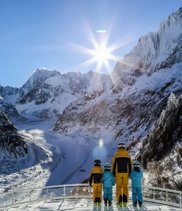 Family enjoying sunny mountain views from a deck near Chamonix Alps.