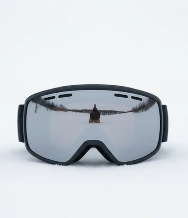 Minimalist black ski goggles as part of a monochromatic ski outfit.