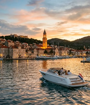 VIP island hopping Split speedboat passing Hvar town at golden hour