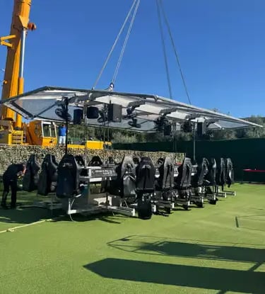 Crew conducting ground-level safety inspection of Dinner in the Sky racing seats and crane