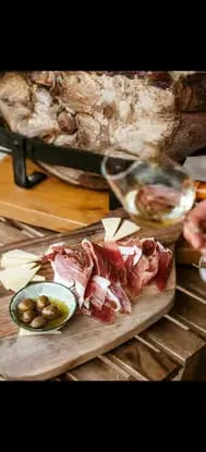 Dalmatian prosciutto, cheese and olives paired with white wine on private gourmet tour Croatia