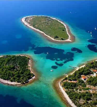 Aerial view of Blue Lagoon turquoise waters and pine islands near Drvenik, Croatia