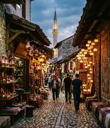  Mostar Old Bazaar cobblestone street with copper shops, Turkish lamps and minaret at dusk