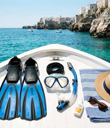 Snorkeling fins mask and gear on white boat deck with Puglia cliffs in background