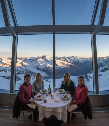 Four people dining at a table in a modern restaurant with floor-to-ceiling windows overlooking a pan